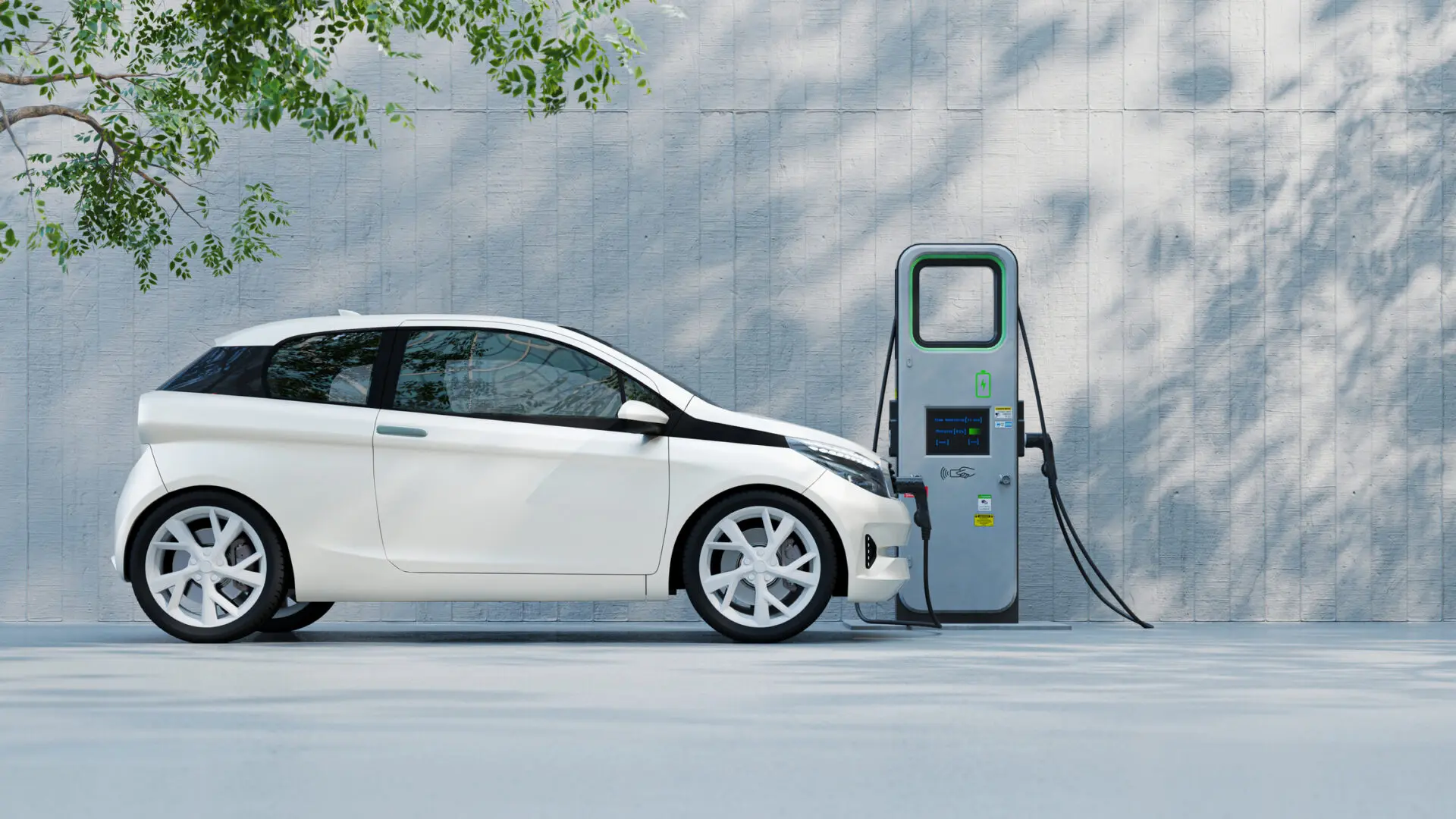 Electric car charging at a charging station.
